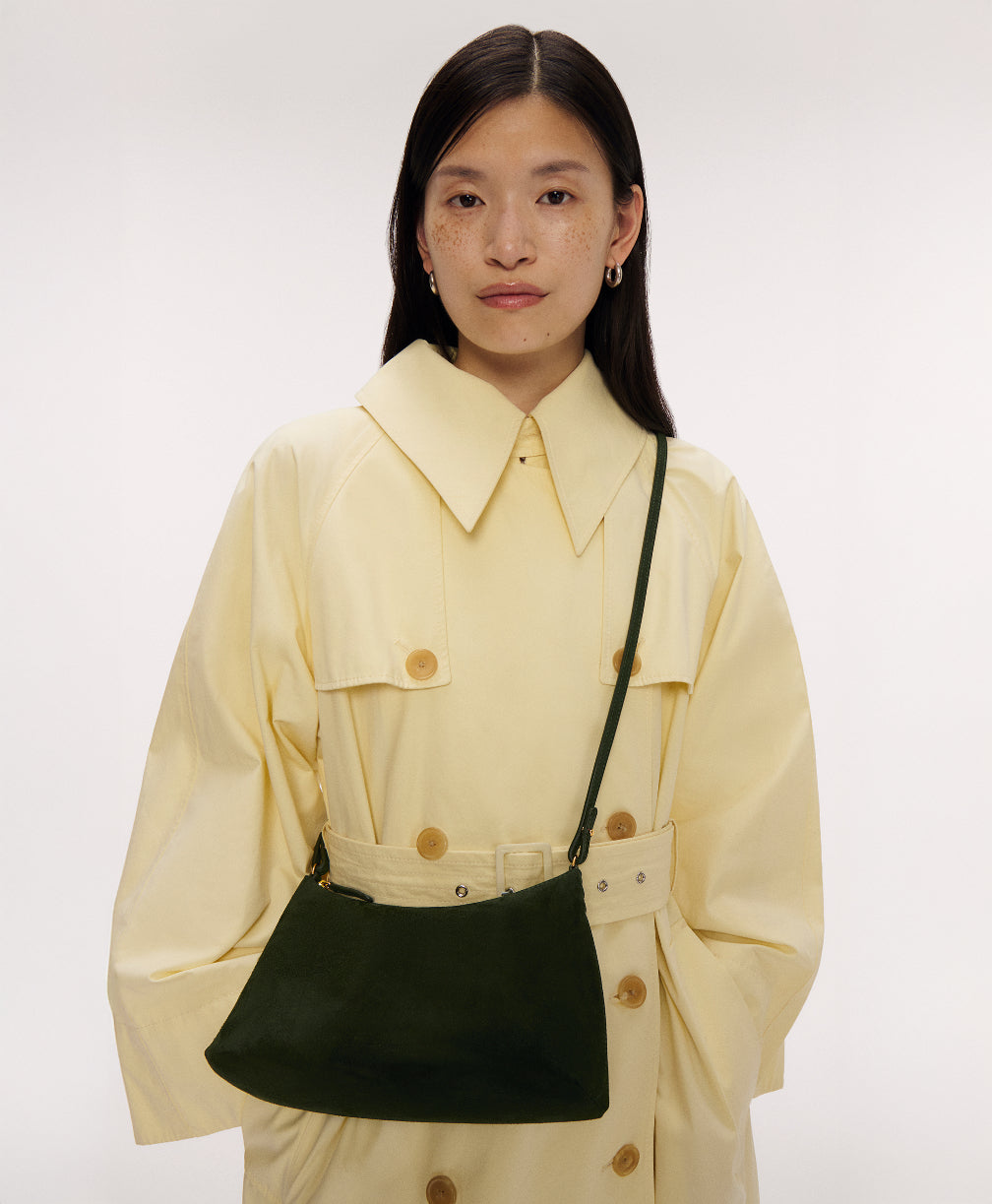 On model image of Rhea Bag - Moss Suede