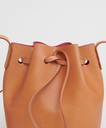 Mansur Gavriel on Instagram: “Our icon Bucket Bag in Cammello 🧡 Made from  rich vegetable tanned leather and designed to e…