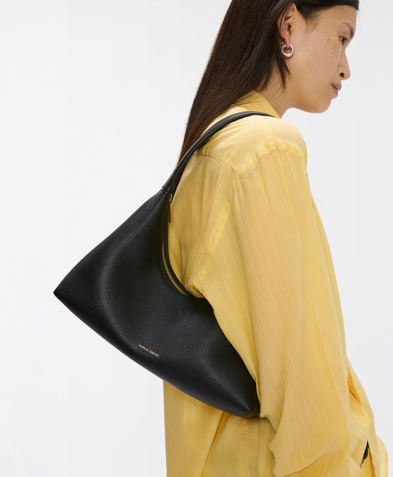 Model wears the Candy Baguette in Black