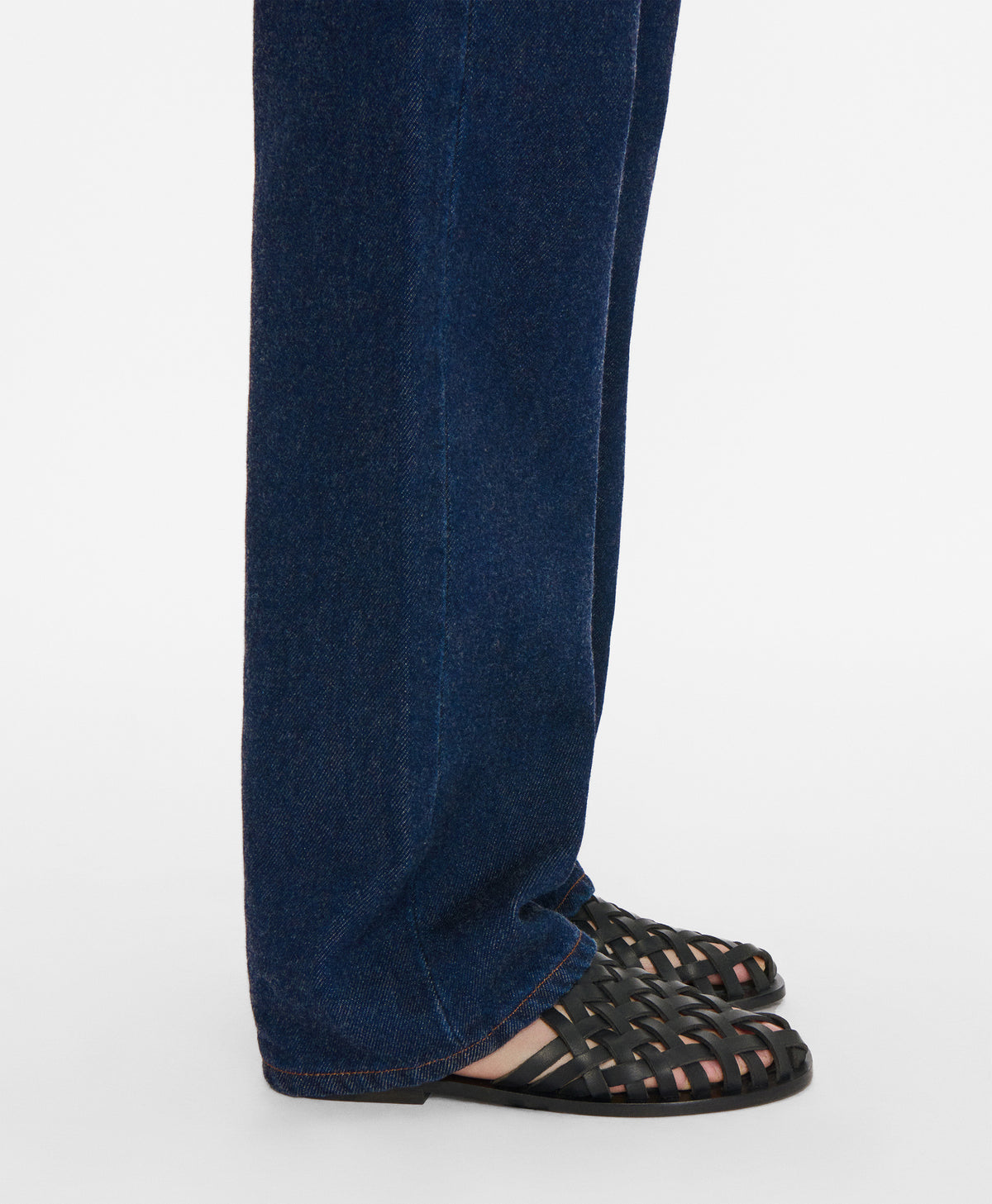 On model of the Woven Sandal in Black