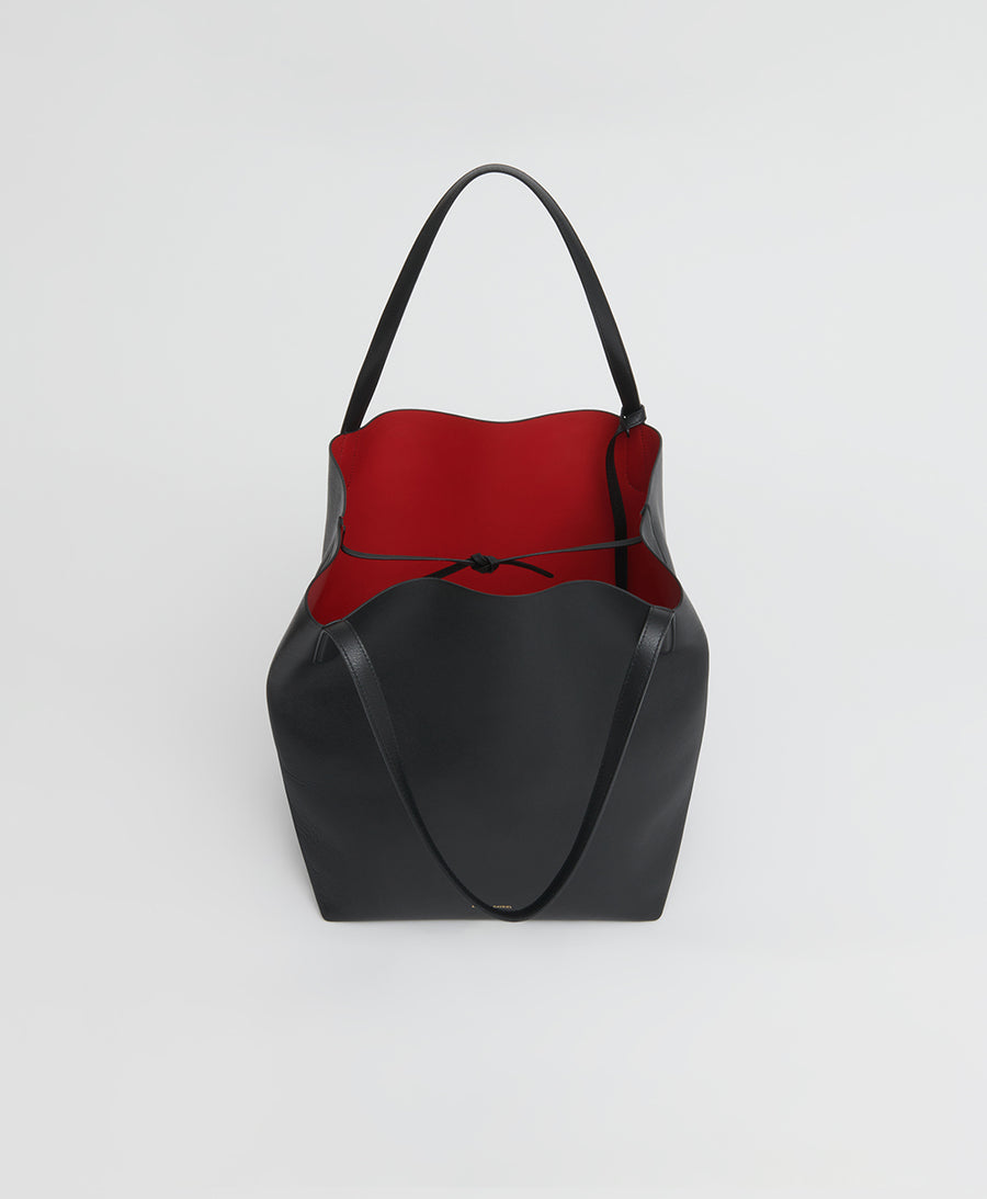 Shop CELINE small drawstring cabas marin in TEXTILE AND CALFSKIN