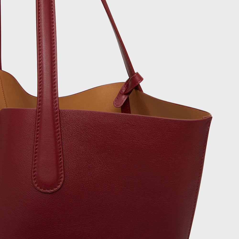 Your work bag, weekend bag, and on-the-go companion all in one. Meet our  Small Structured Tote in Cappuccino.