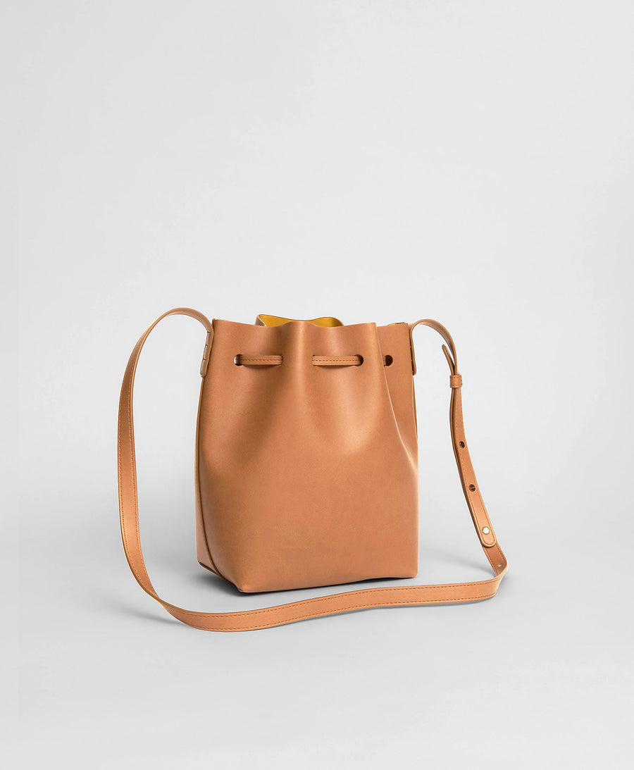 Mansur Gavriel on Instagram: “Our icon Bucket Bag in Cammello 🧡 Made from  rich vegetable tanned leather and designed to e…